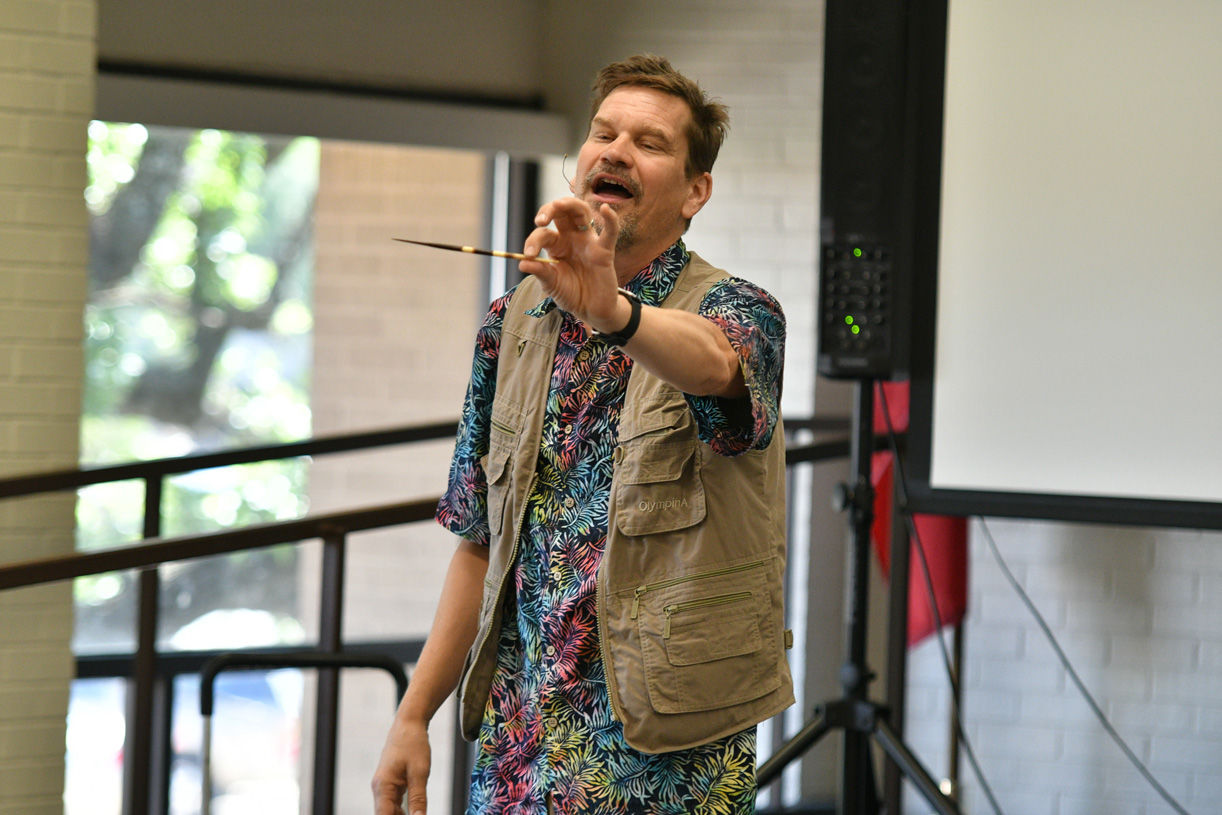 Singing zoologist Lucas Miller visits Bryan library